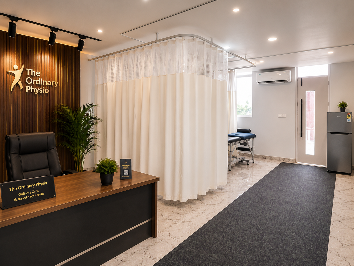 Modern physiotherapy and rehabilitation center interior at The Ordinary Physio in Noida featuring private treatment cubicles, premium therapy space, orthopedic rehabilitation facilities, ground floor accessibility, and a clean evidence-based clinical environment.